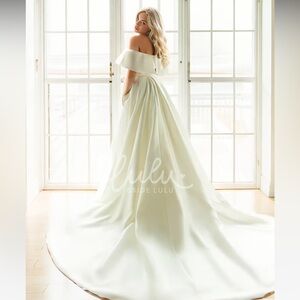 Wedding dress- never worn- tags still attached